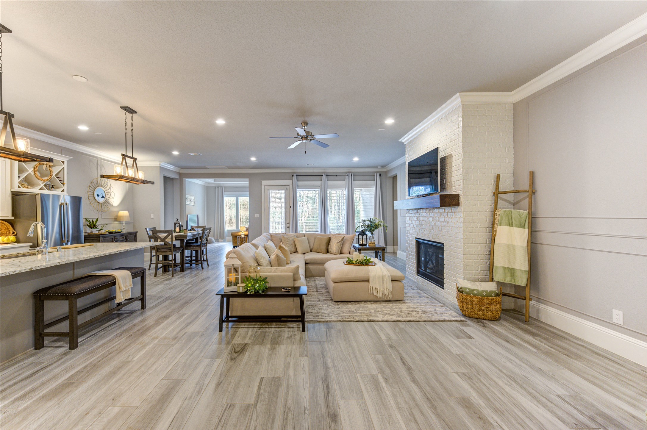 2160 Rope Maker Road Conroe, TX 77384 - Photo 16 of 43 a living room with furniture and a fireplace