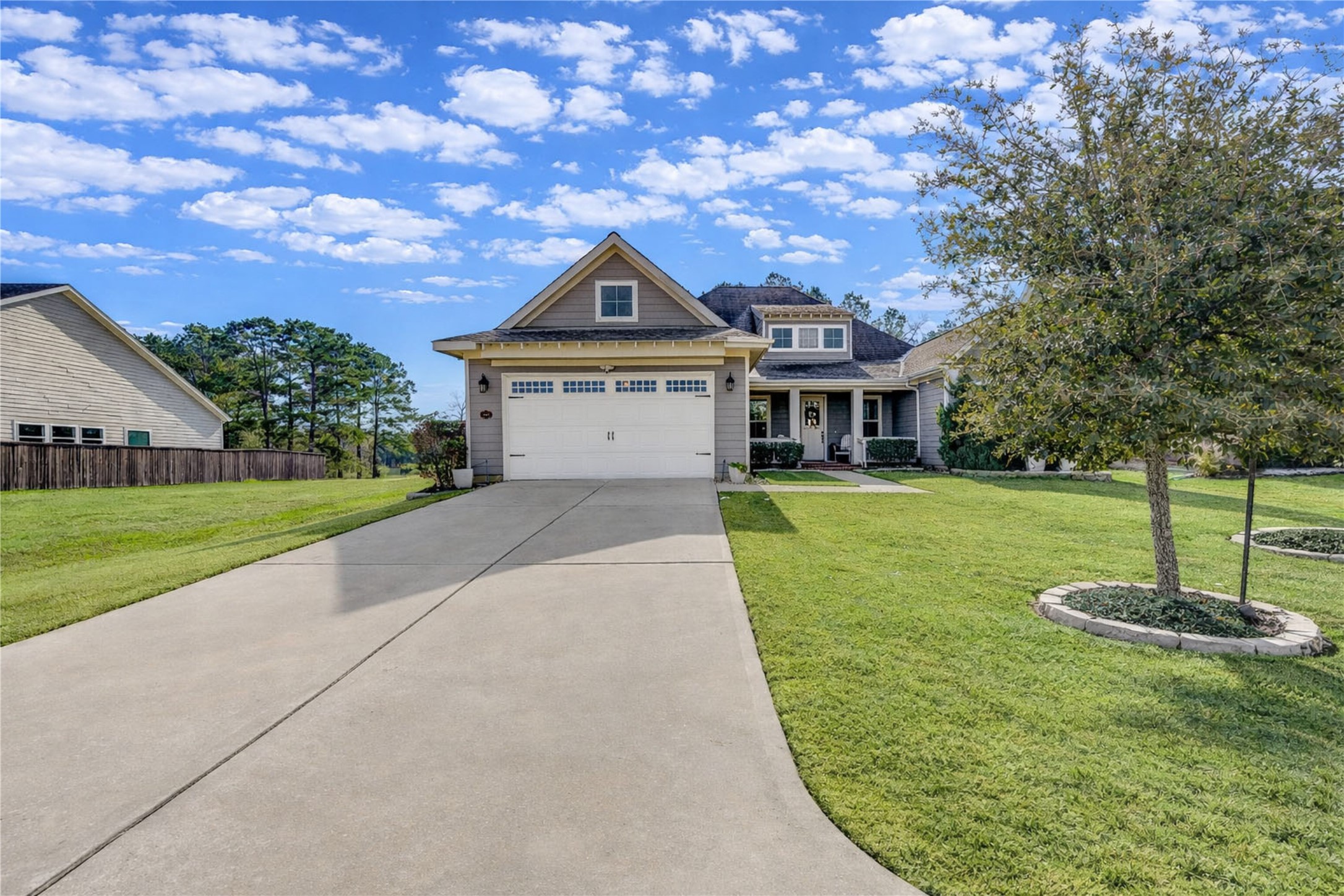 2160 Rope Maker Road Conroe, TX 77384 - Photo 2 of 43 a front view of a house with a yard