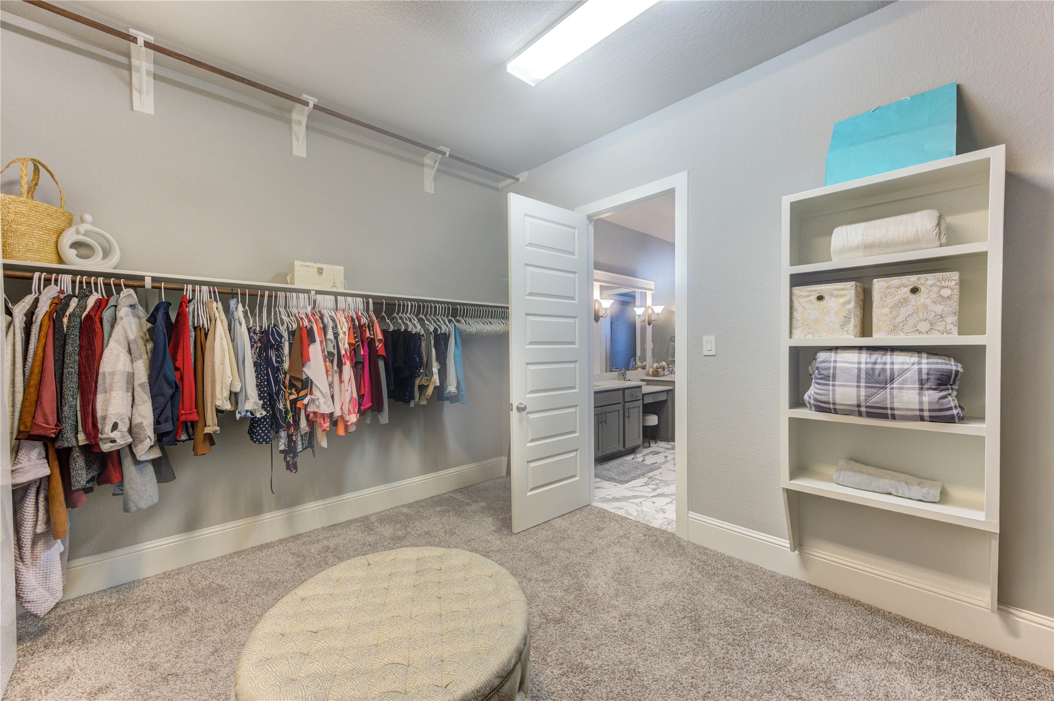 2160 Rope Maker Road Conroe, TX 77384 - Photo 28 of 43 a view of walk in closet with clothes and shoes