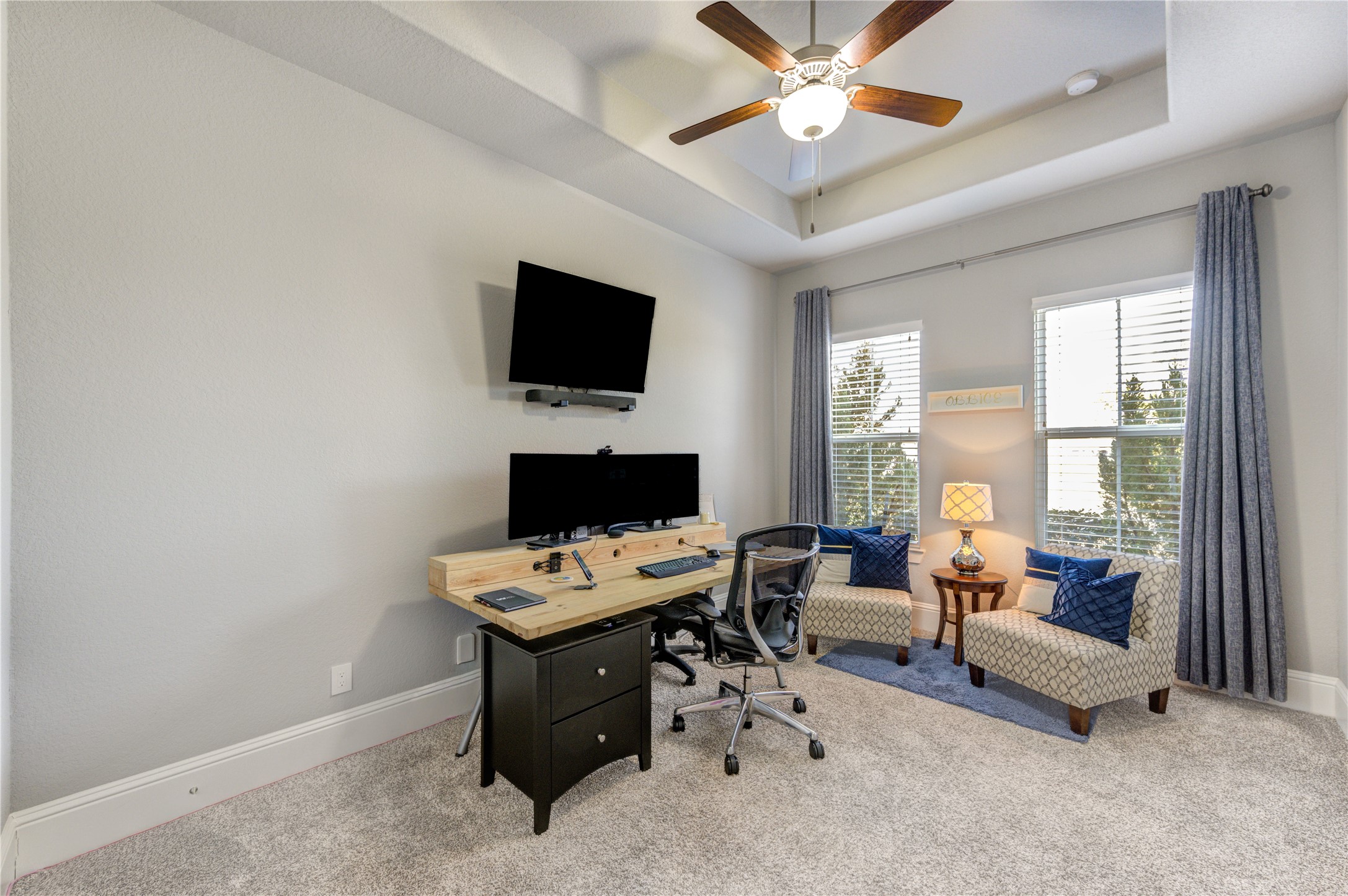 2160 Rope Maker Road Conroe, TX 77384 - Photo 31 of 43 a living room with furniture a flat screen tv and a window
