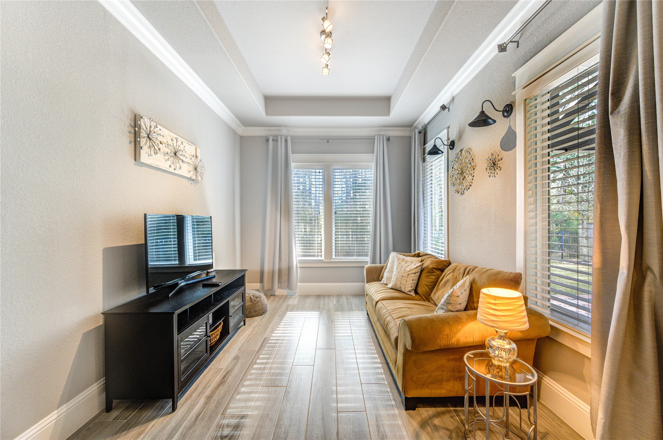 2160 Rope Maker Road Conroe, TX 77384 - Photo 39 of 43 a living room with furniture and a flat screen tv