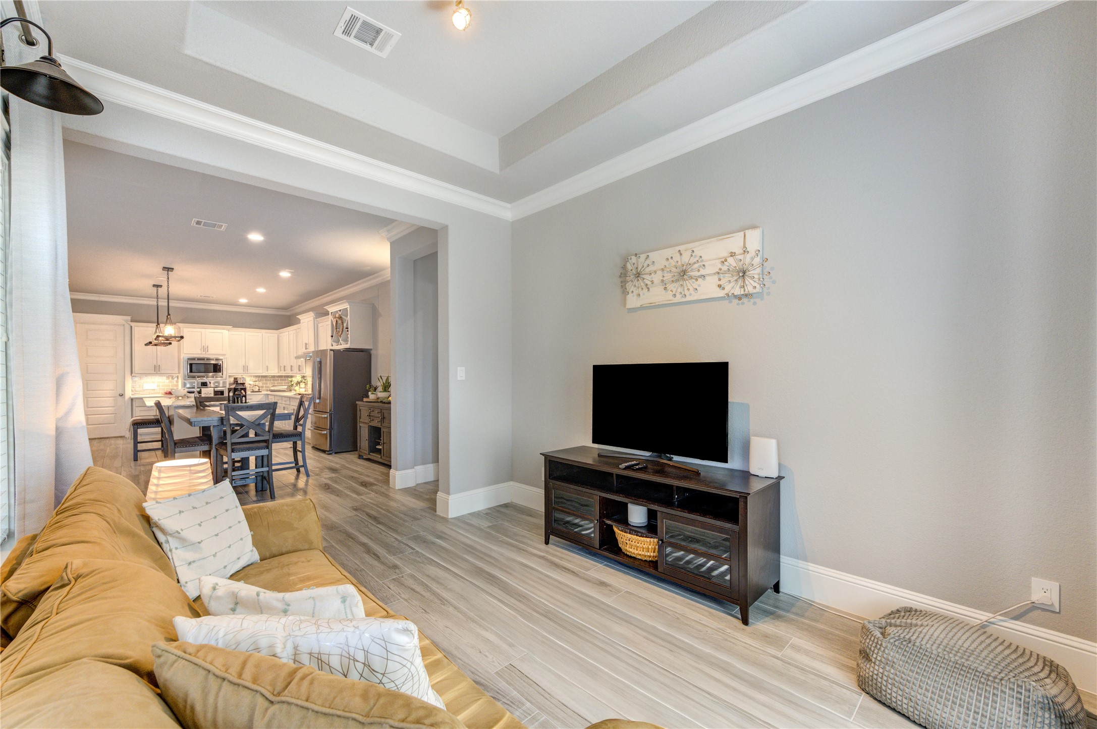 2160 Rope Maker Road Conroe, TX 77384 - Photo 40 of 43 a living room with furniture and a flat screen tv