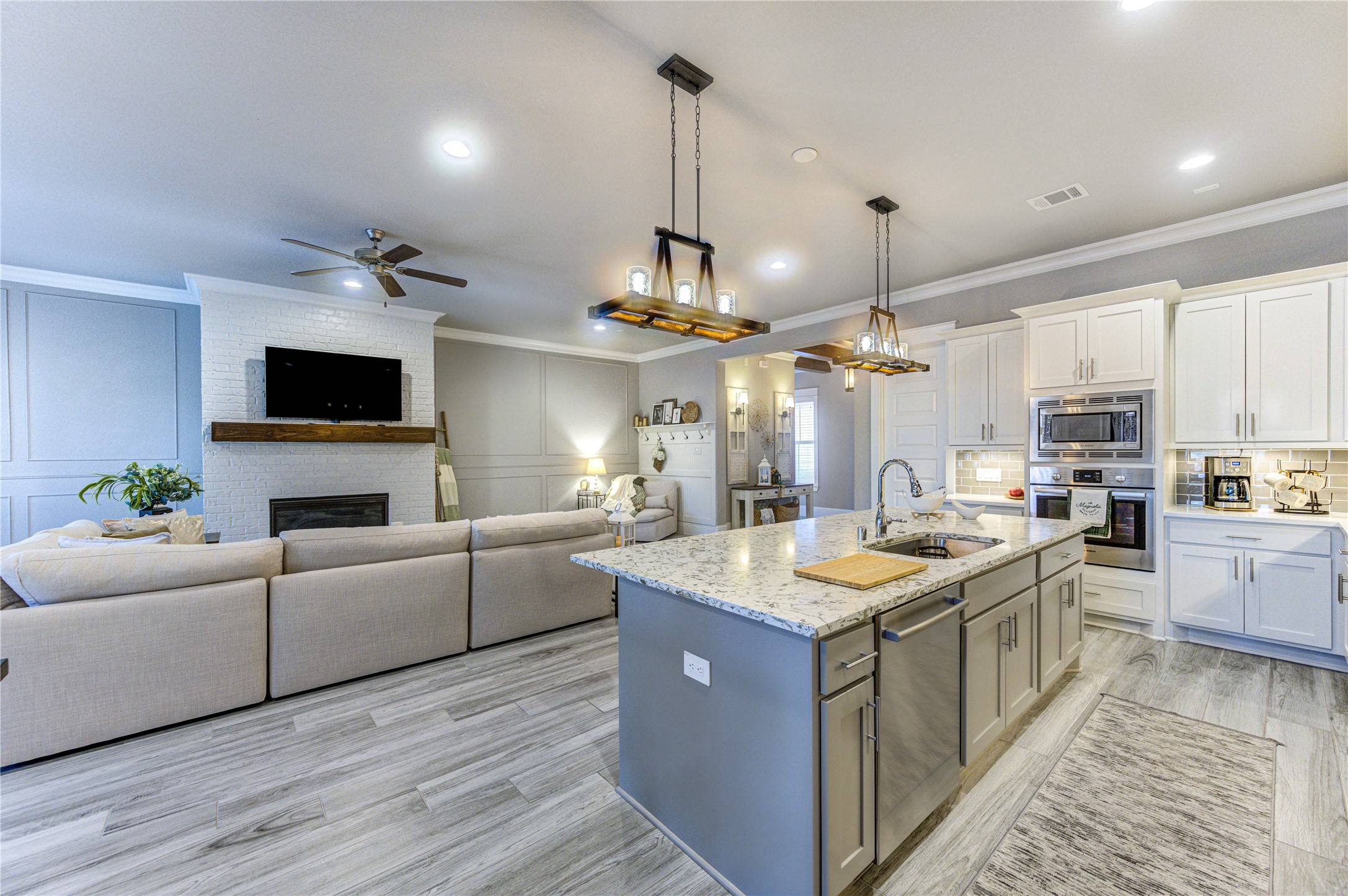 2160 Rope Maker Road Conroe, TX 77384 - Photo 9 of 43 a kitchen with a stove a sink and a refrigerator