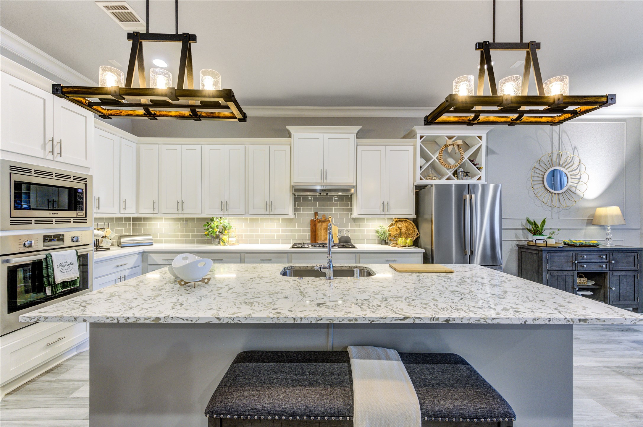 2160 Rope Maker Road Conroe, TX 77384 - Photo 10 of 43 a kitchen with kitchen island granite countertop stainless steel appliances a stove a sink and a counter space