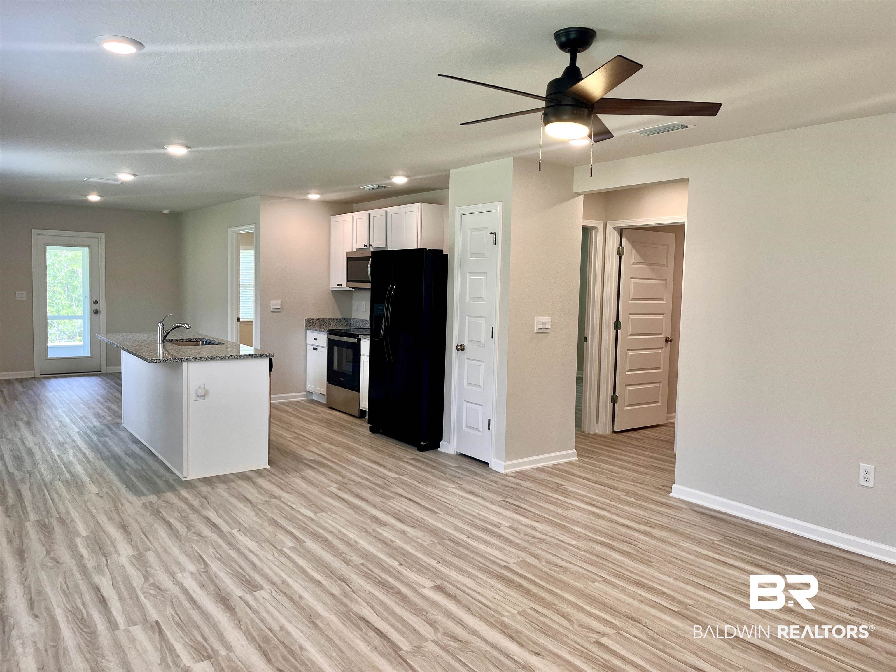 8891 Summer Bay Lane Foley, AL 36535 - Photo 14 of 54 Bedrooms 2 & 3 and 2nd bathroom on right.