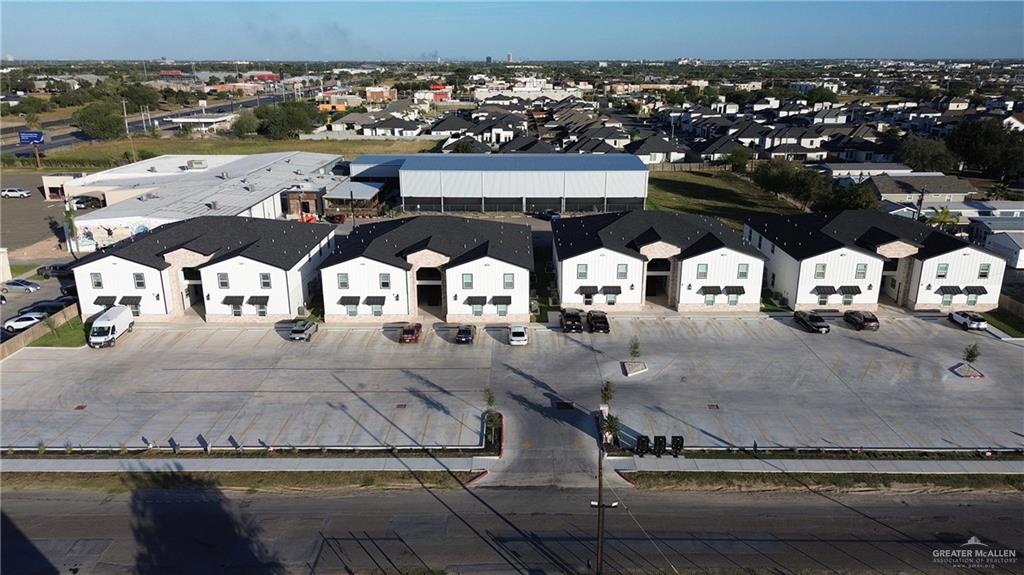 720 Ragland Road, Unit 1 Mission, TX 78572 - Photo 3 of 4 a view of building with an outdoor seating