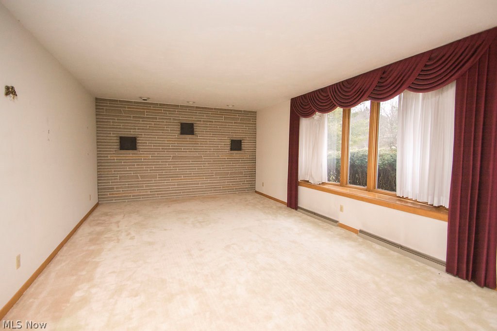 1877 Spring Valley Avenue Northwest Canton, OH 44708 - Photo 8 of 24 Large living room with bay window offering lots of natural light.