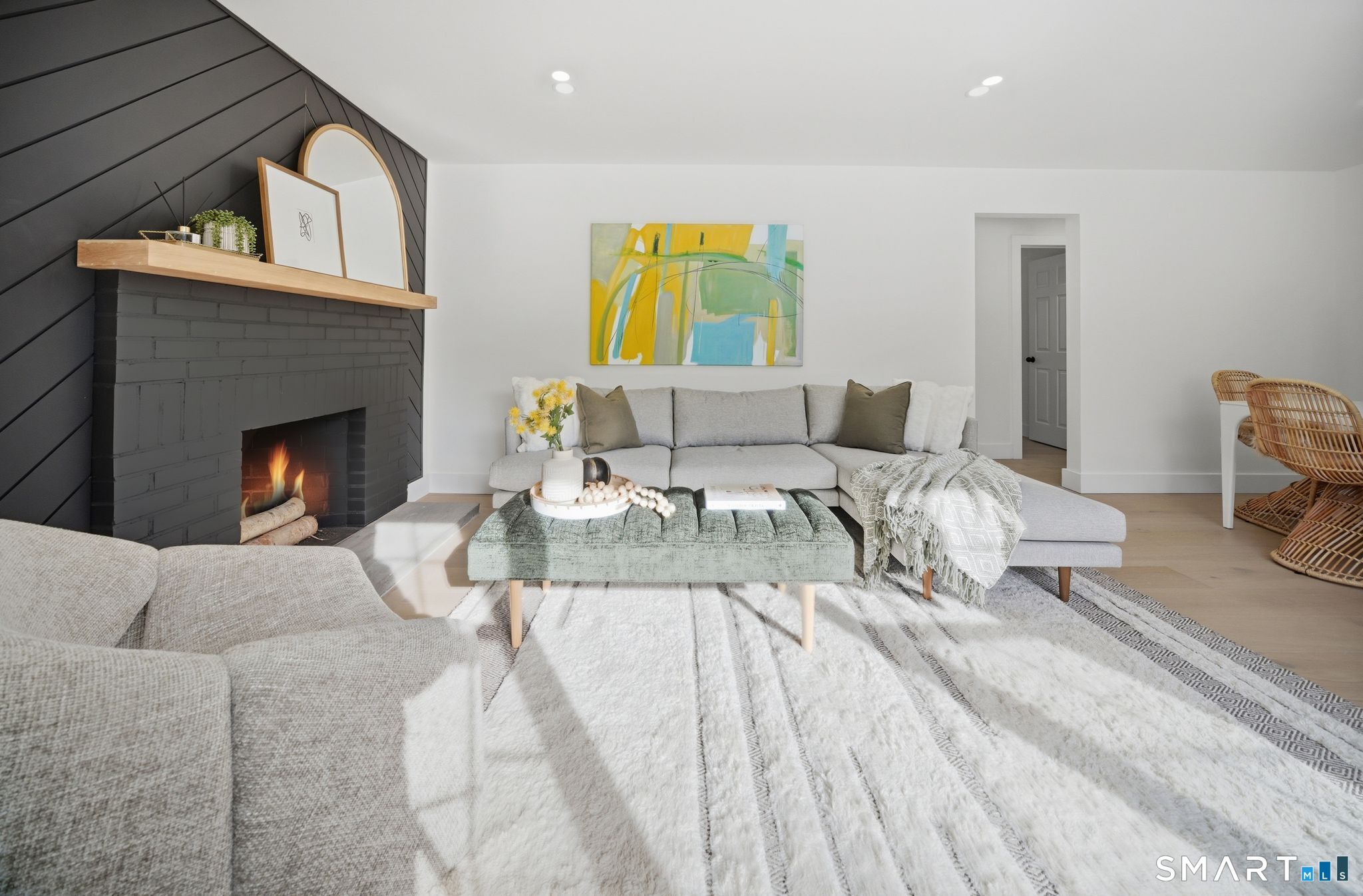 101 Parade Hill Road New Canaan, CT 06840 - Photo 11 of 40 a living room with furniture and a fireplace