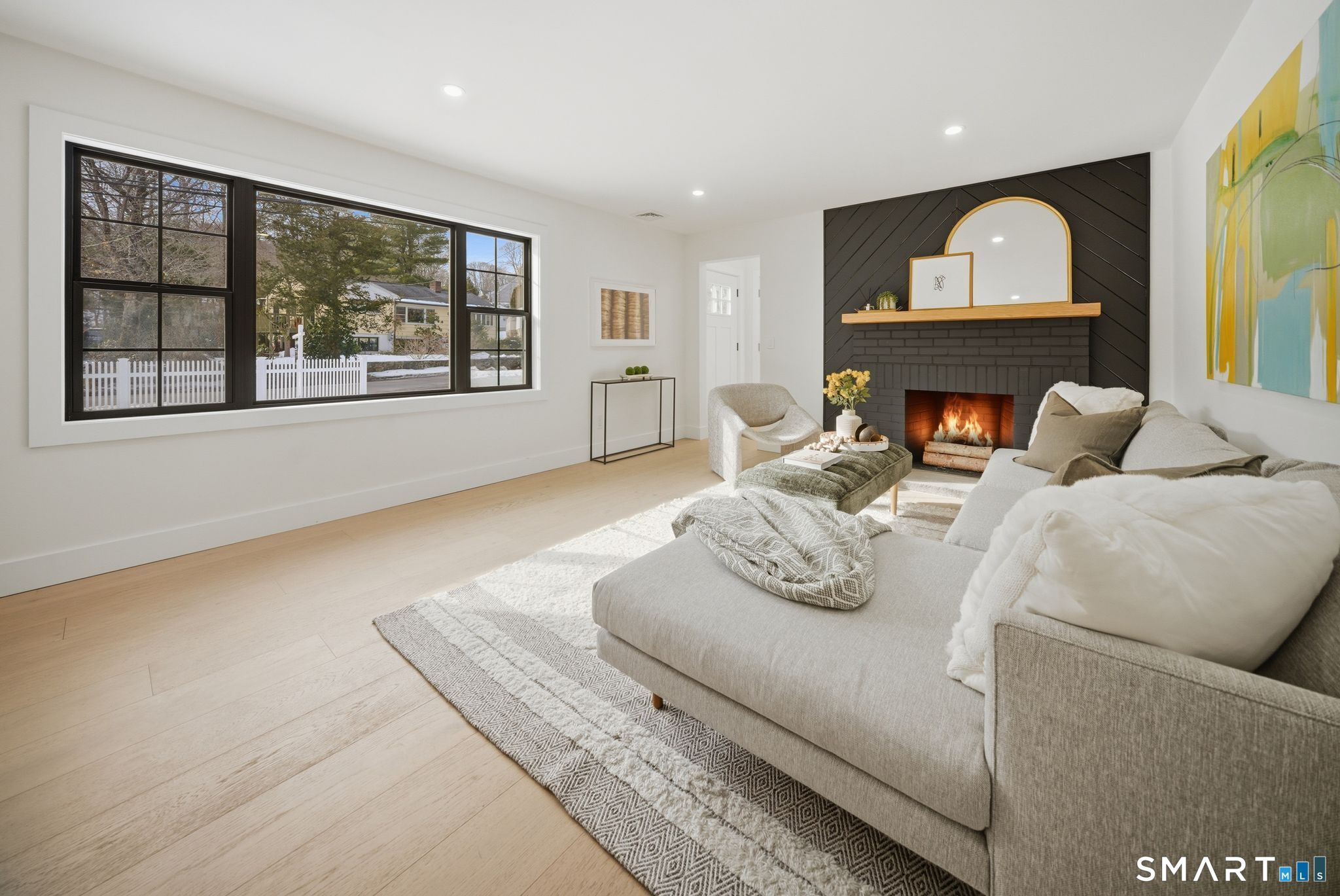 101 Parade Hill Road New Canaan, CT 06840 - Photo 14 of 40 a living room with furniture and a large window