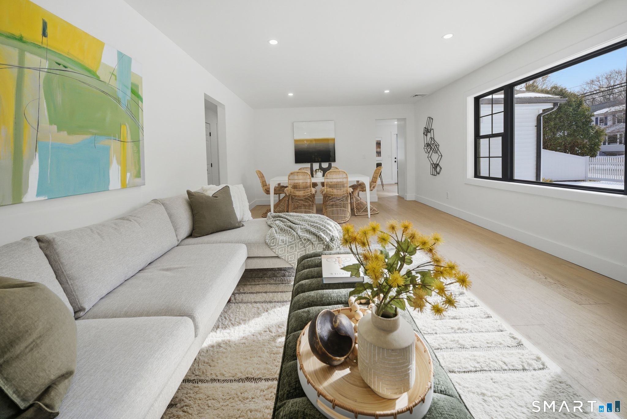 101 Parade Hill Road New Canaan, CT 06840 - Photo 16 of 40 a living room with furniture or chandelier and a wooden floor