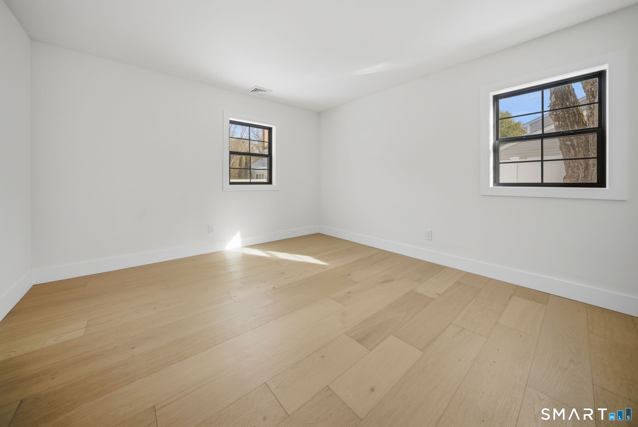 101 Parade Hill Road New Canaan, CT 06840 - Photo 27 of 40 an empty room with windows