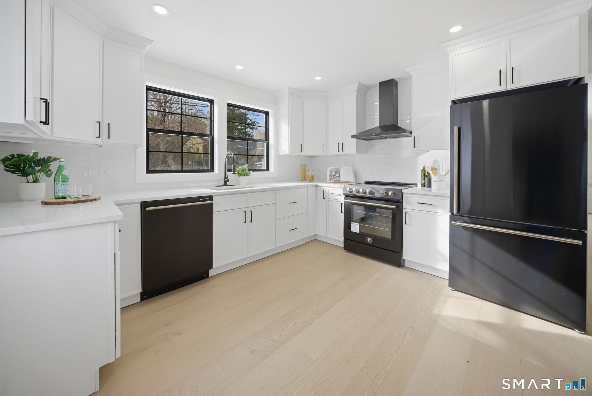 101 Parade Hill Road New Canaan, CT 06840 - Photo 3 of 40 a kitchen with a refrigerator stove and sink