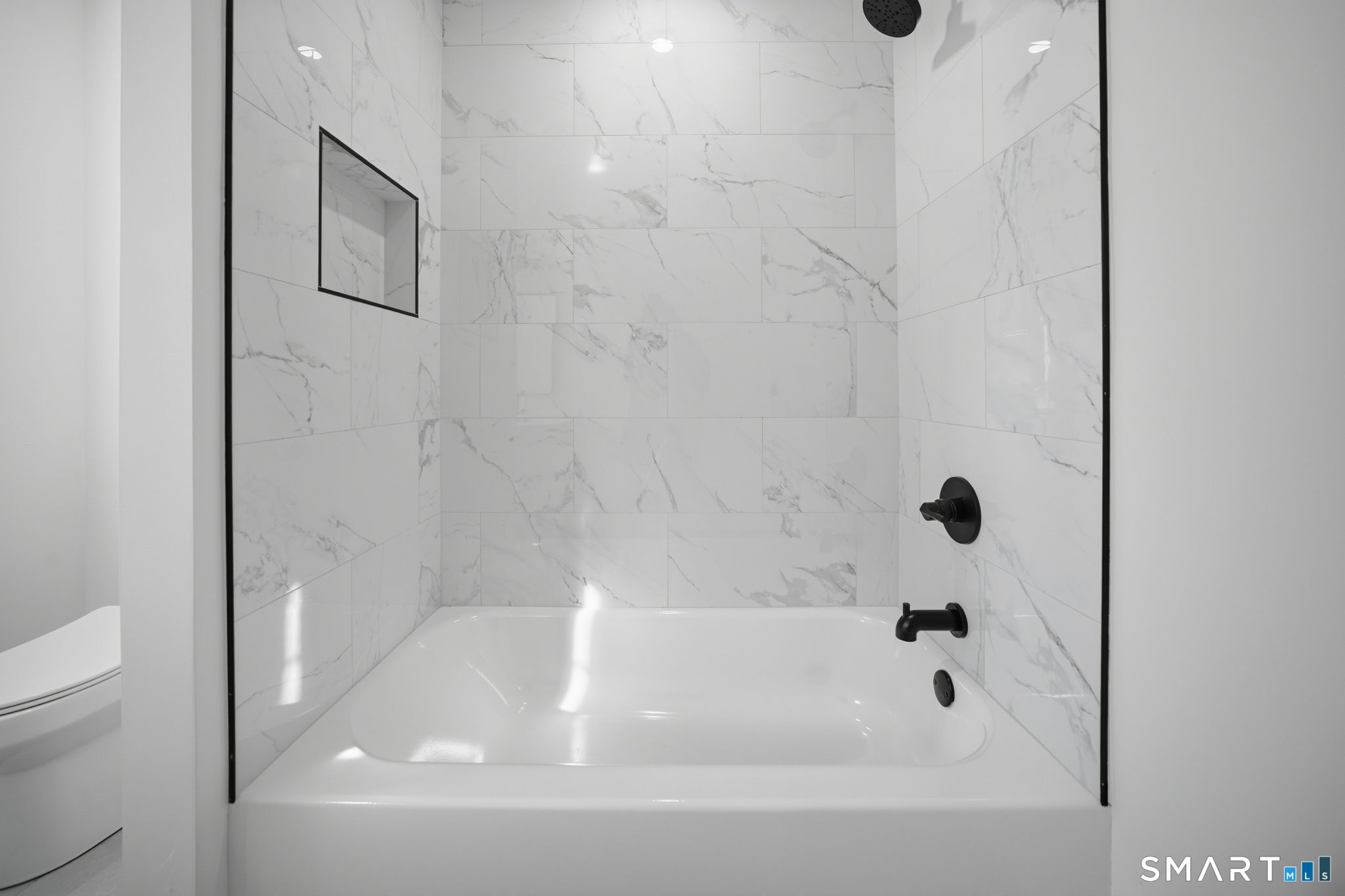 101 Parade Hill Road New Canaan, CT 06840 - Photo 35 of 40 a bathroom with a bathtub