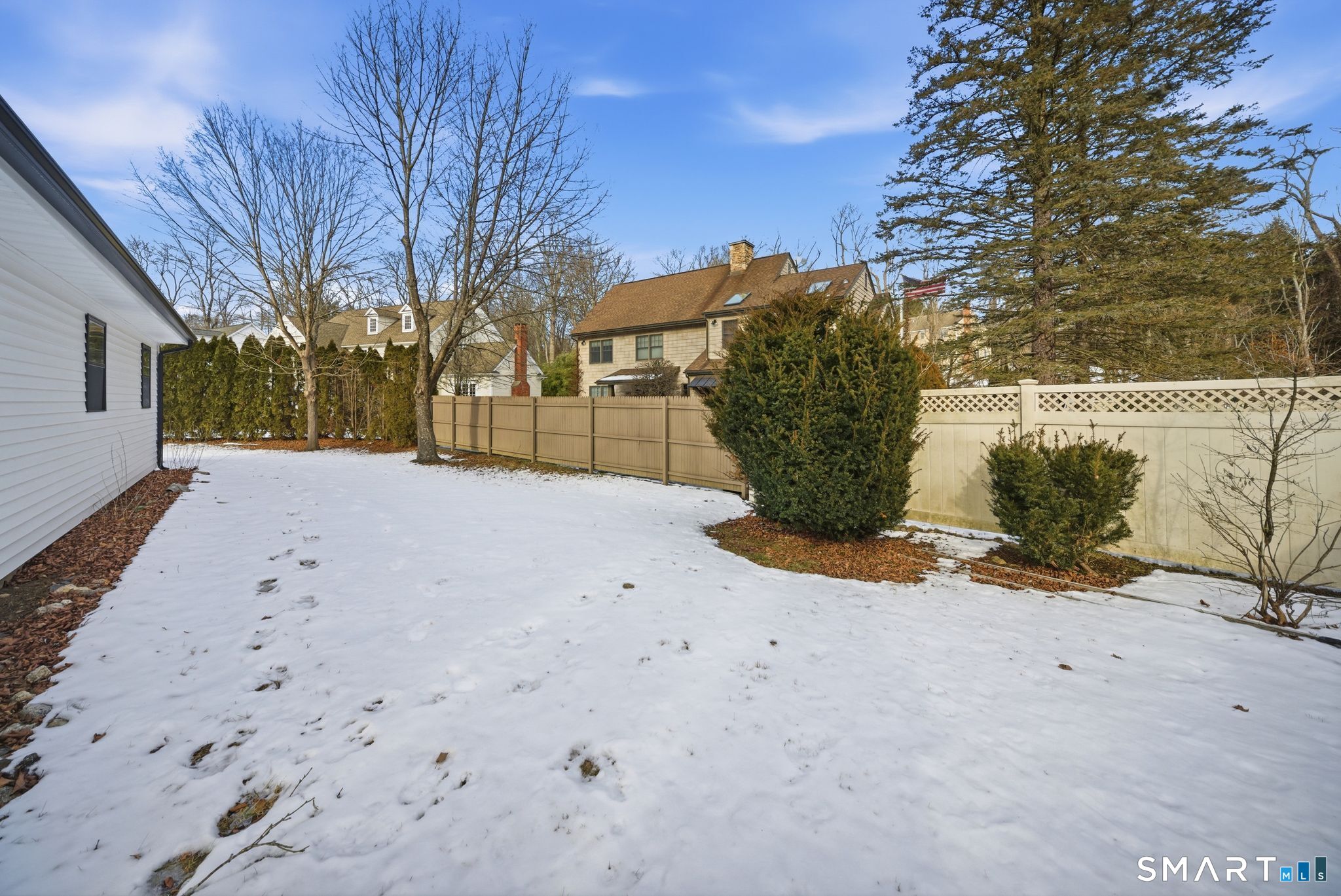 101 Parade Hill Road New Canaan, CT 06840 - Photo 39 of 40 a view of a dirt road with a building in the background