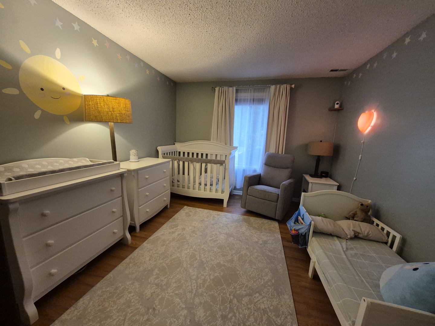 8216 Mulberry Court, Unit 8B Palos Hills, IL 60465 - Photo 11 of 22 a bedroom with furniture and a lamp