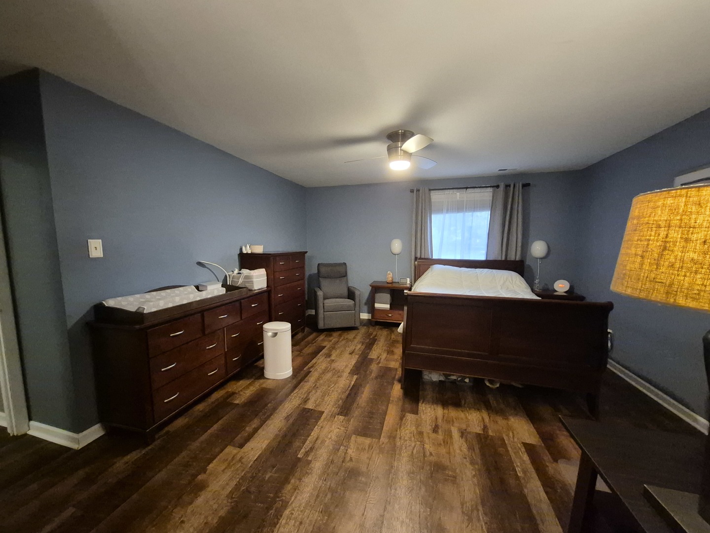 8216 Mulberry Court, Unit 8B Palos Hills, IL 60465 - Photo 16 of 22 a bedroom with a bed and wooden floor