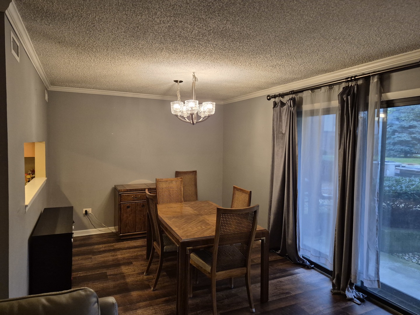 8216 Mulberry Court, Unit 8B Palos Hills, IL 60465 - Photo 5 of 22 a view of a dining room with furniture and wooden floor