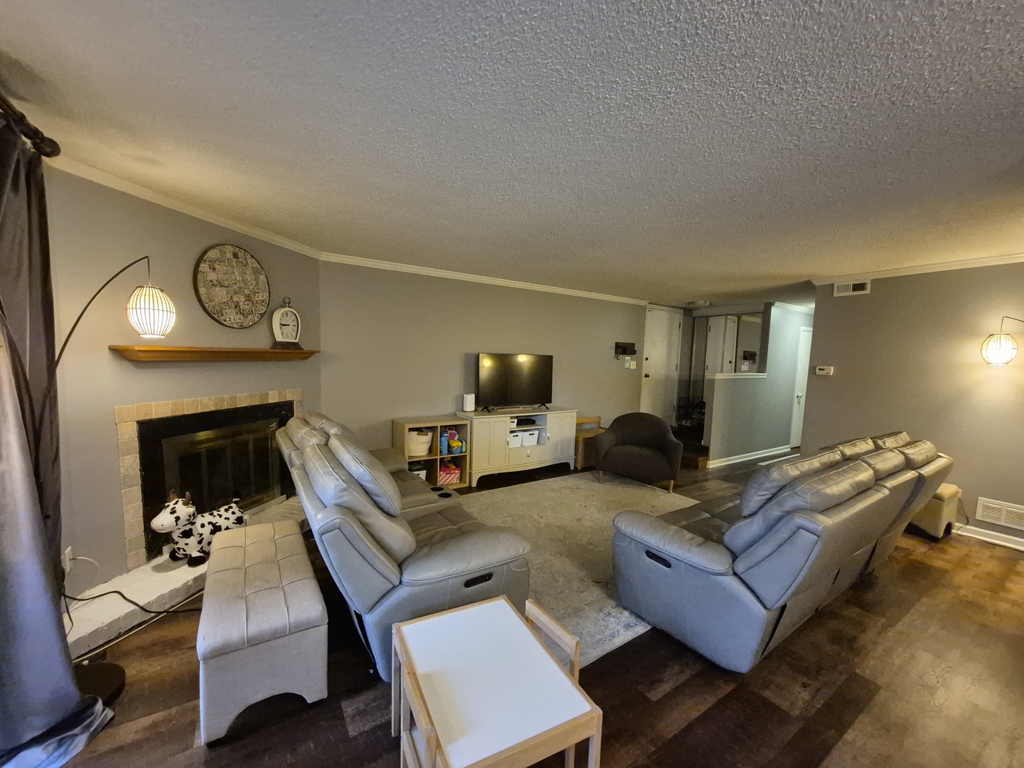 8216 Mulberry Court, Unit 8B Palos Hills, IL 60465 - Photo 6 of 22 a living room with furniture and a fireplace