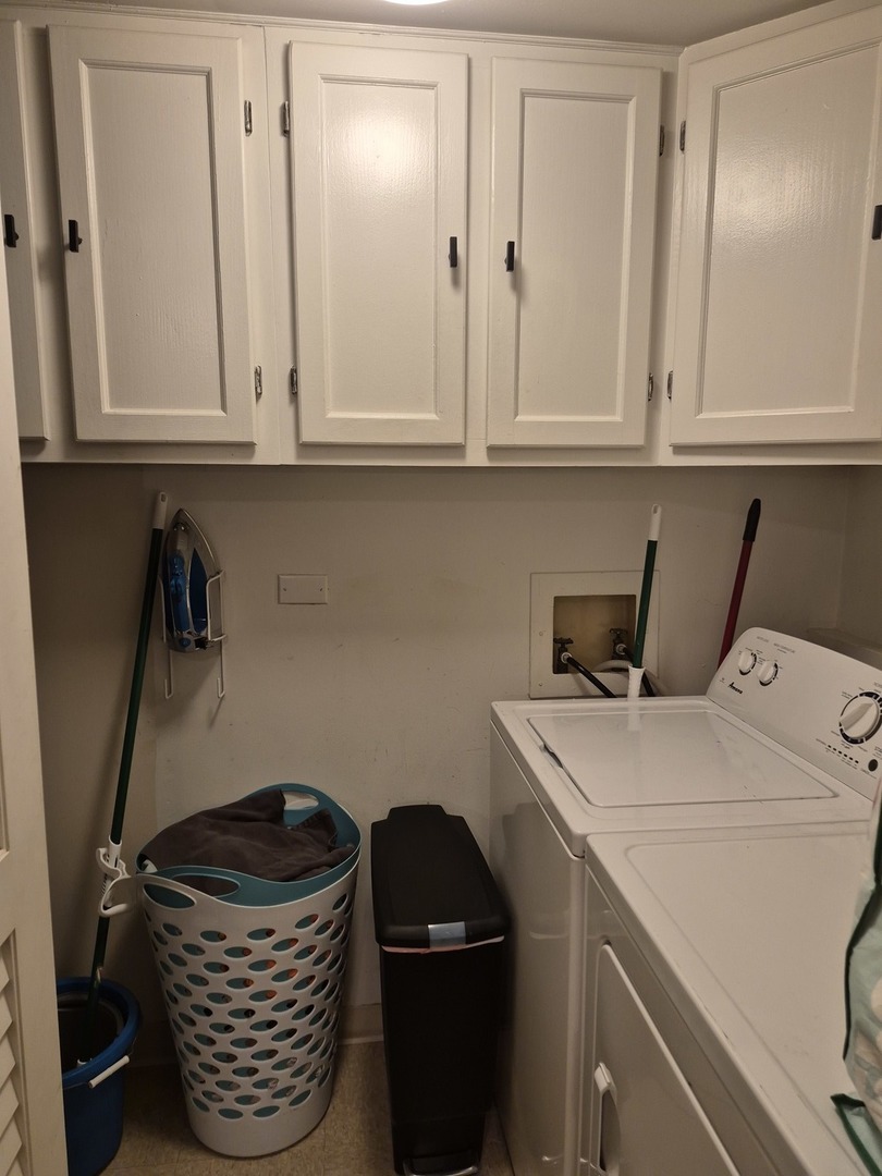 8216 Mulberry Court, Unit 8B Palos Hills, IL 60465 - Photo 9 of 22 a kitchen with a sink and cabinets