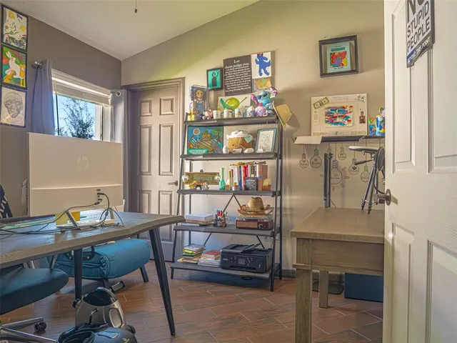 a work room with furniture