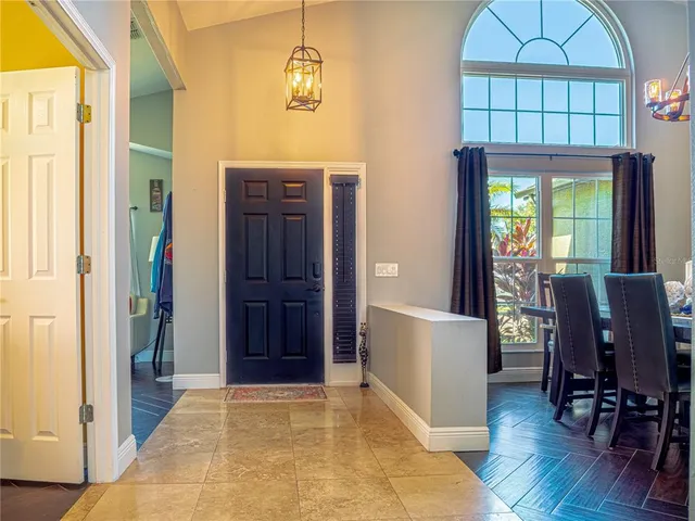 a view of a livingroom with furniture and window