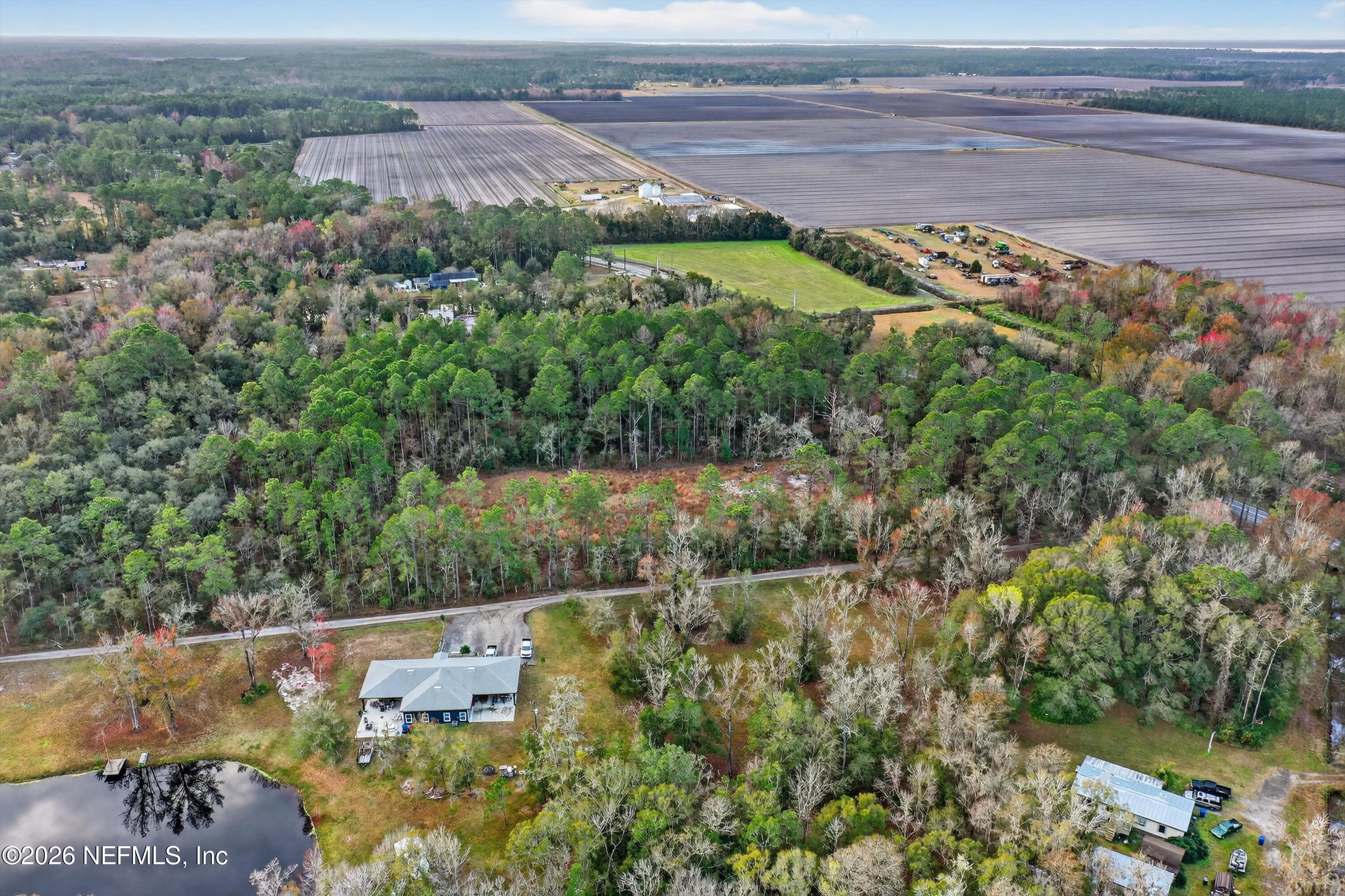 3570 Joe Ashton Road St. Augustine, FL 32092 - Photo 22 of 22 an aerial view of a houses with a yard