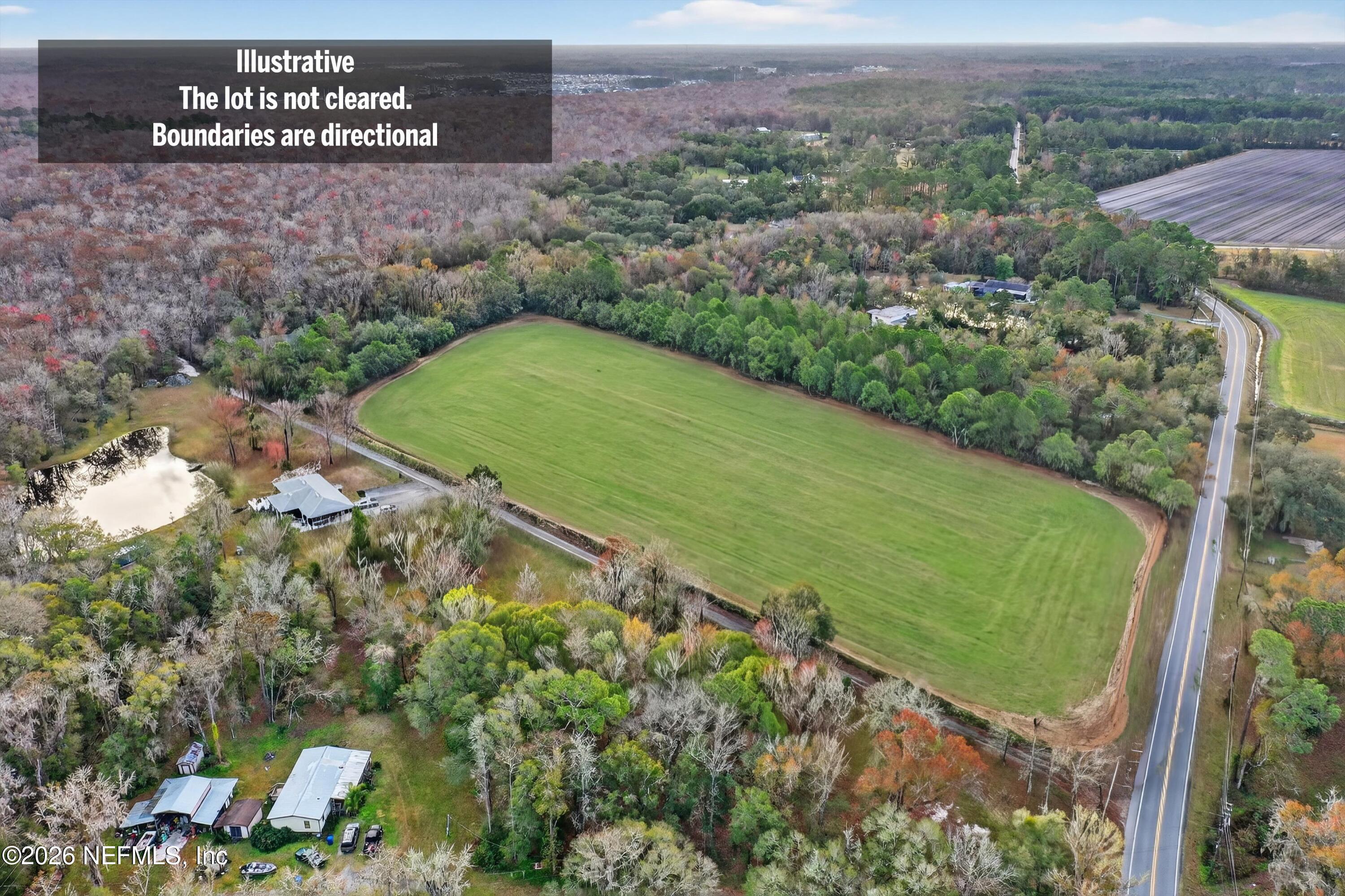 3570 Joe Ashton Road St. Augustine, FL 32092 - Photo 4 of 22 an aerial view of a golf course with a park