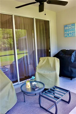 a living room with a couch and a table