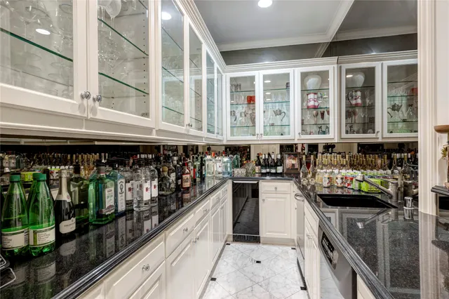 a kitchen with a stove and a refrigerator