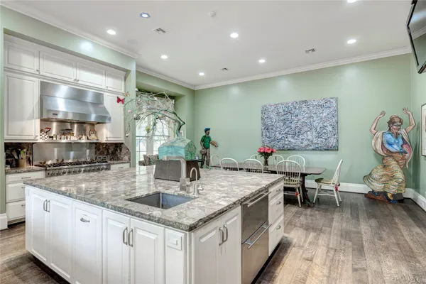 a bedroom with two beds and painted walls