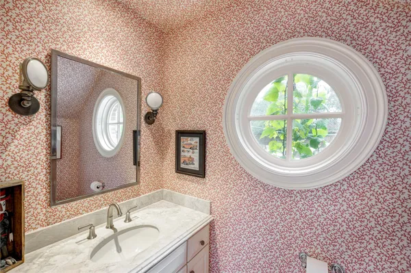 a view of a house with a yard patio and sitting area
