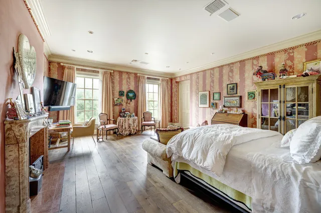 a bed room with a bed and furniture