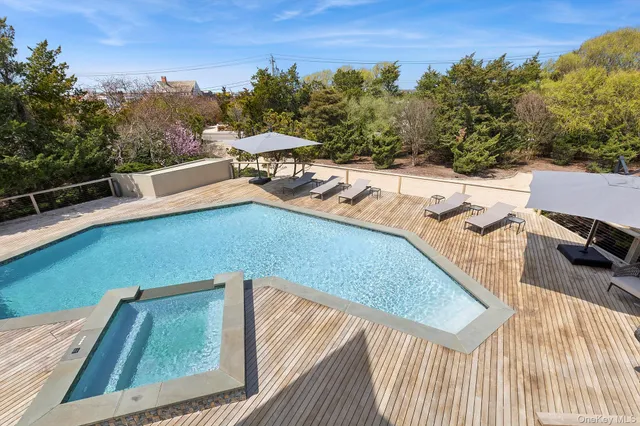 a view of a terrace with sitting area