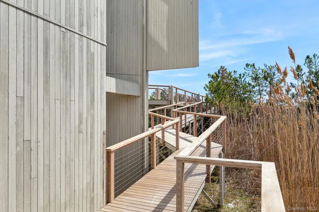 a view of balcony and wooden floor