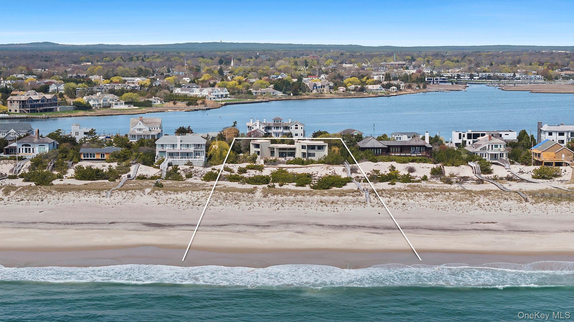 199 Dune Road Westhampton Beach, NY 11978 - Photo 30 of 38 an aerial view of a house with a ocean view