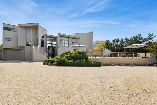 a view of a swimming pool with lounge chair