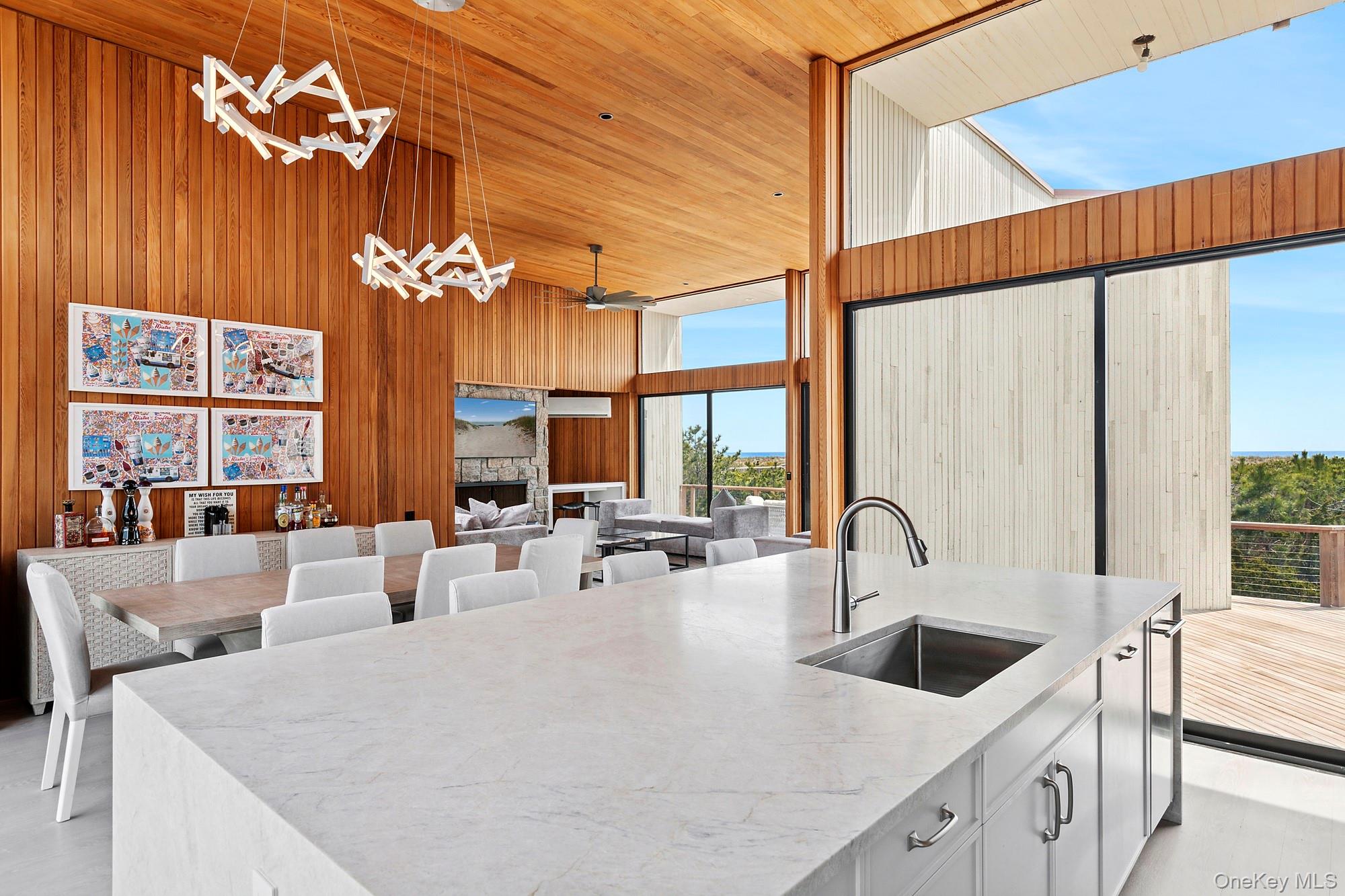 199 Dune Road Westhampton Beach, NY 11978 - Photo 8 of 38 a large kitchen with a large window