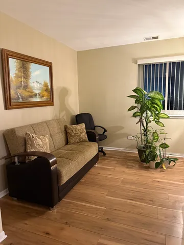 a balcony with trees in the background