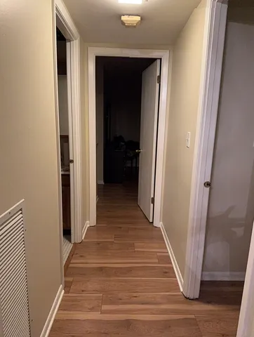 a view of balcony with furniture