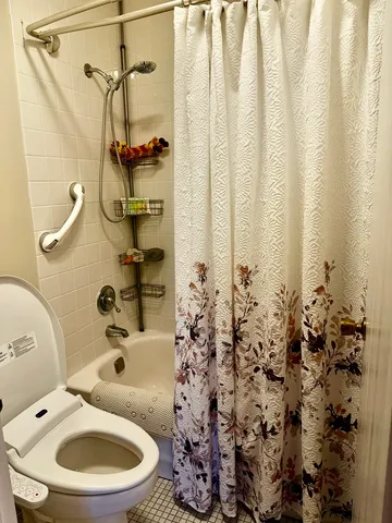 a view of a lake with houses in the back