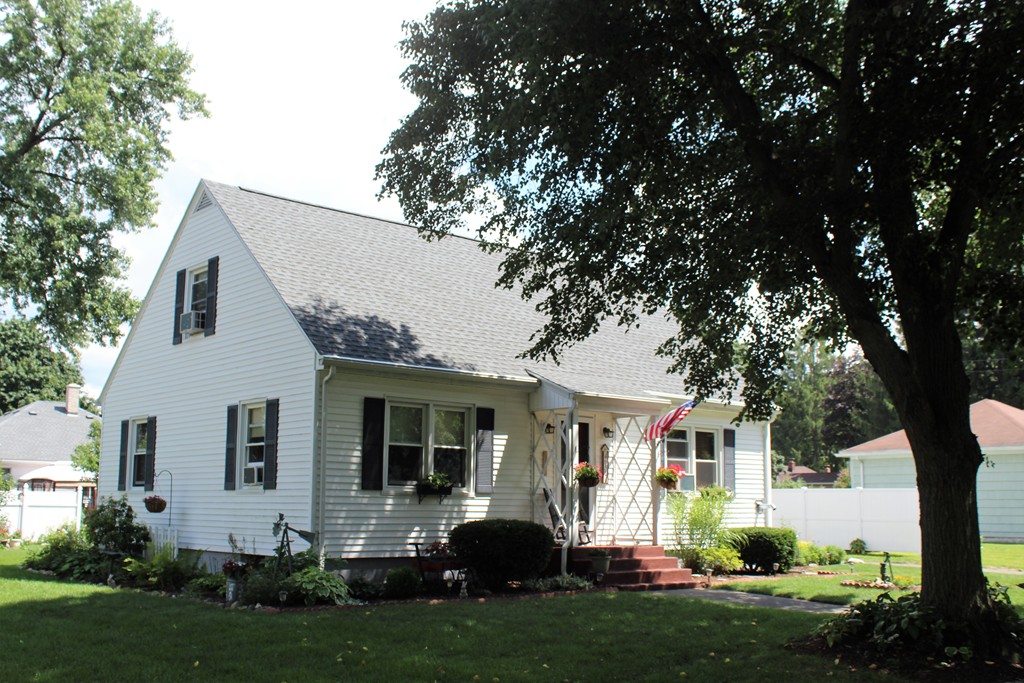 65 Primrose Street Springfield, MA 01151 - Photo 2 of 30 front view of a house with a yard