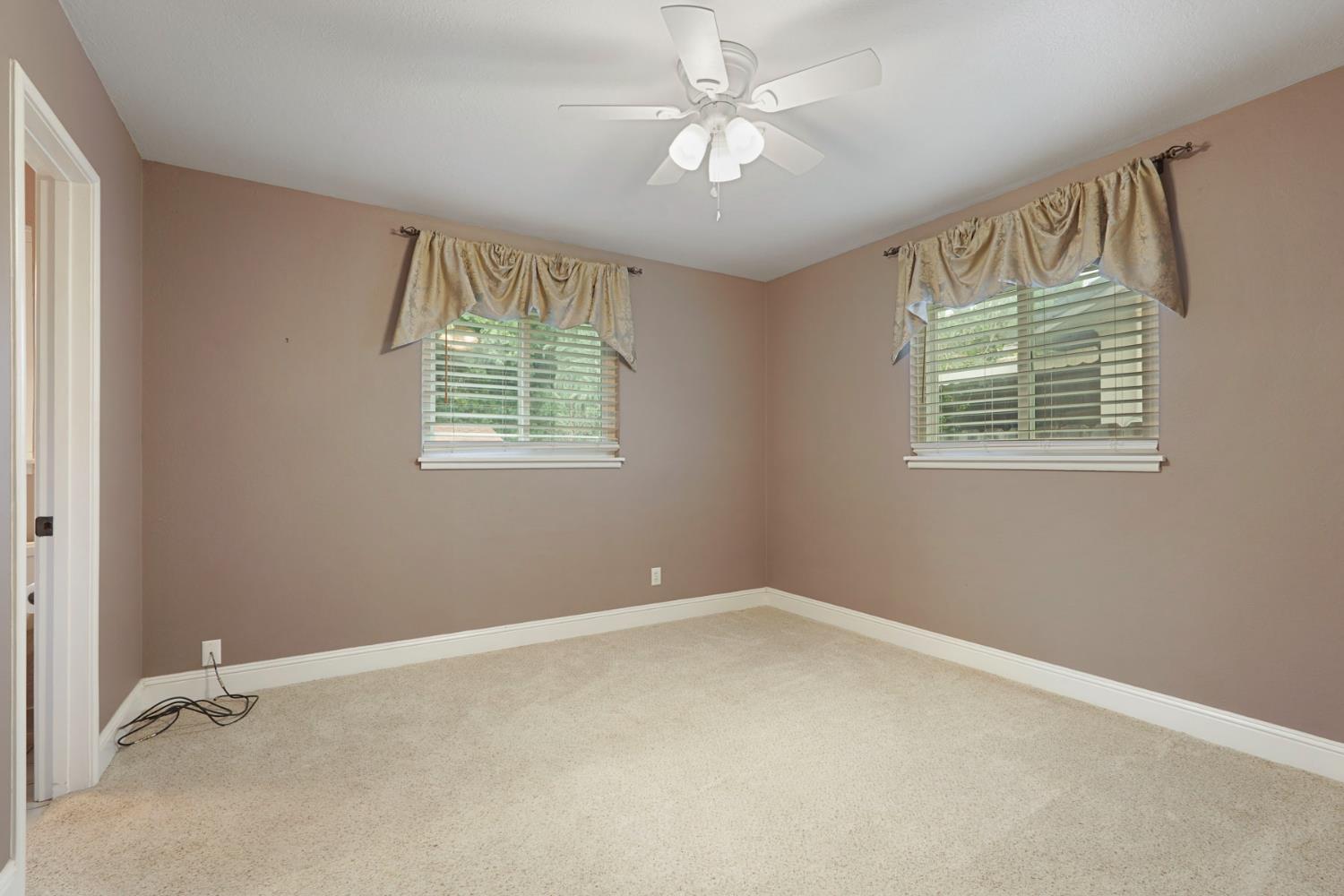 1007 Cardinal Street Lodi, CA 95240 - Photo 19 of 31 a view of an empty room with a window