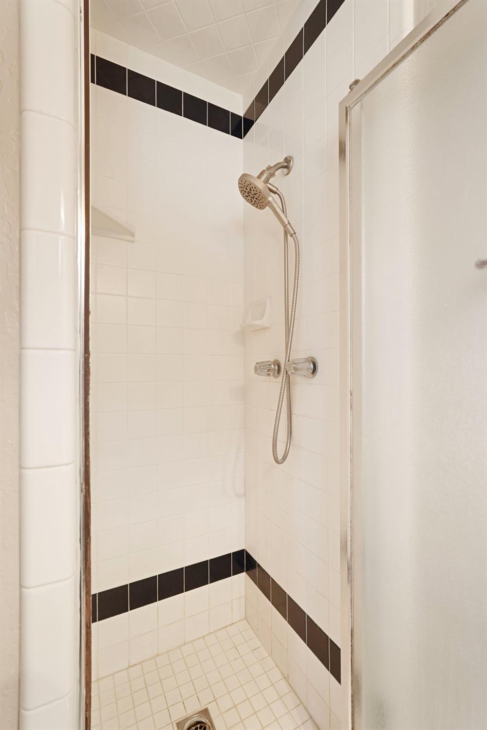 1007 Cardinal Street Lodi, CA 95240 - Photo 23 of 31 a bathroom with a shower