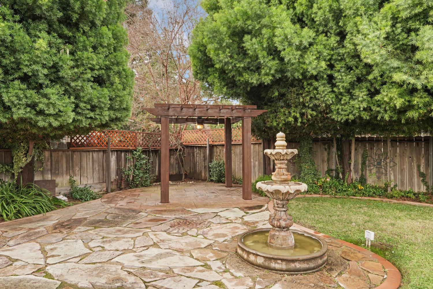 1007 Cardinal Street Lodi, CA 95240 - Photo 27 of 31 a house with swimming pool in front of it