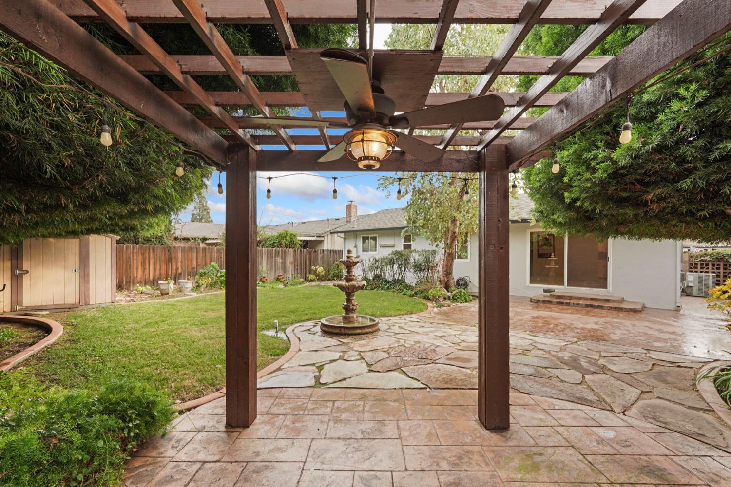 1007 Cardinal Street Lodi, CA 95240 - Photo 29 of 31 a view of a porch with furniture and a yard