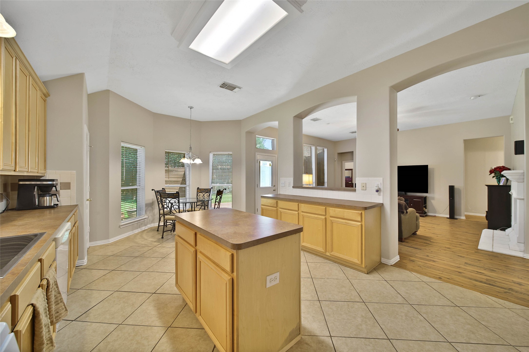 21338 Timber Pines Drive Spring, TX 77388 - Photo 14 of 29 a kitchen with a sink a counter top space and appliances