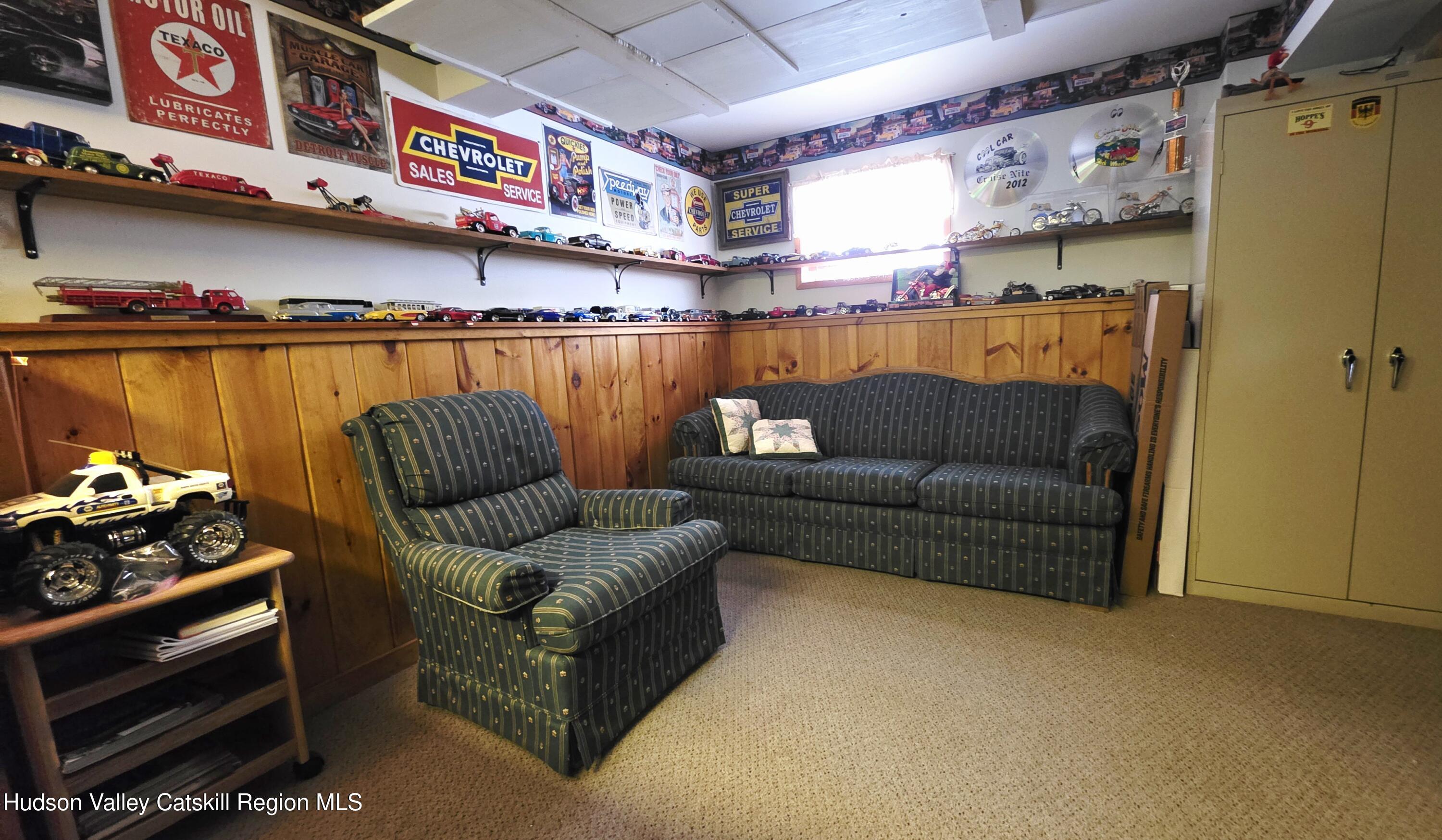 334 Stonitch Road East Durham, NY 12423 - Photo 25 of 46 a living room with furniture and a couch