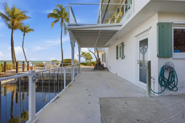 a bedroom with a bed and a table in it