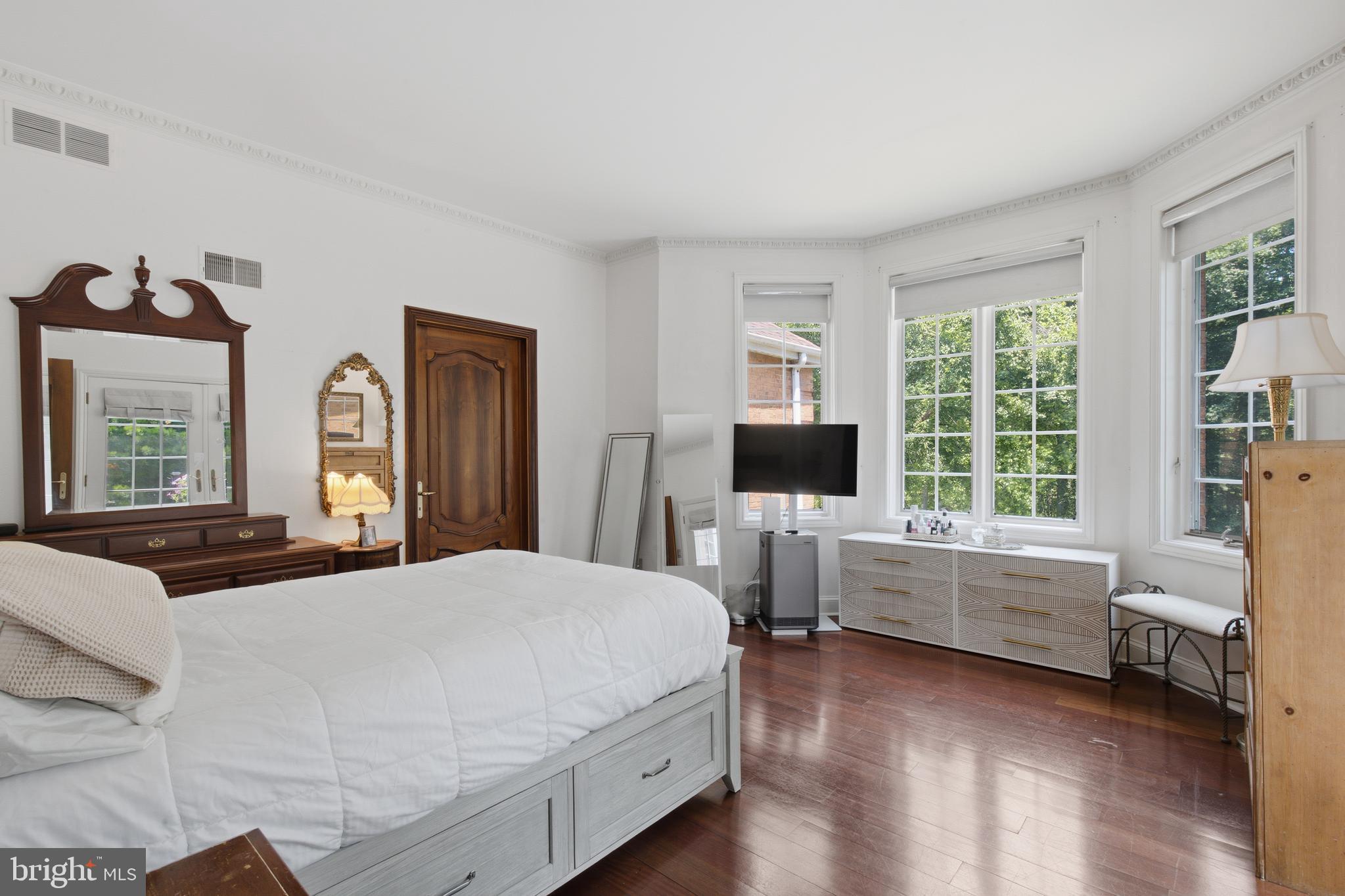 1733 Stocton Road Jenkintown, PA 19046 - Photo 48 of 149 a bedroom with a large bed and a flat screen tv