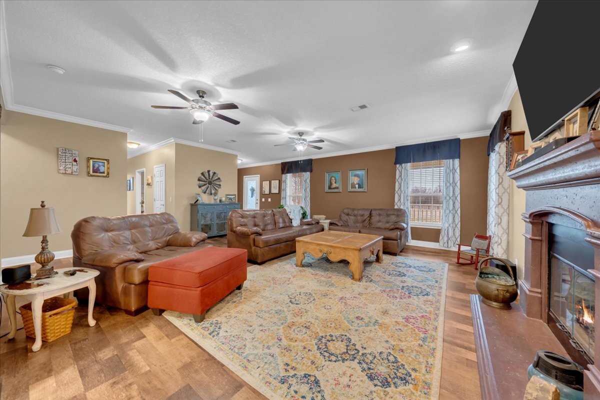 1798 Holly Grove Road Lewisburg, TN 37091 - Photo 11 of 55 a living room with furniture flat screen tv and couches